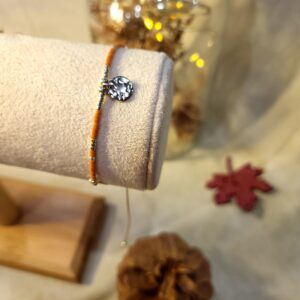 Bracelet perle et breloque martelée