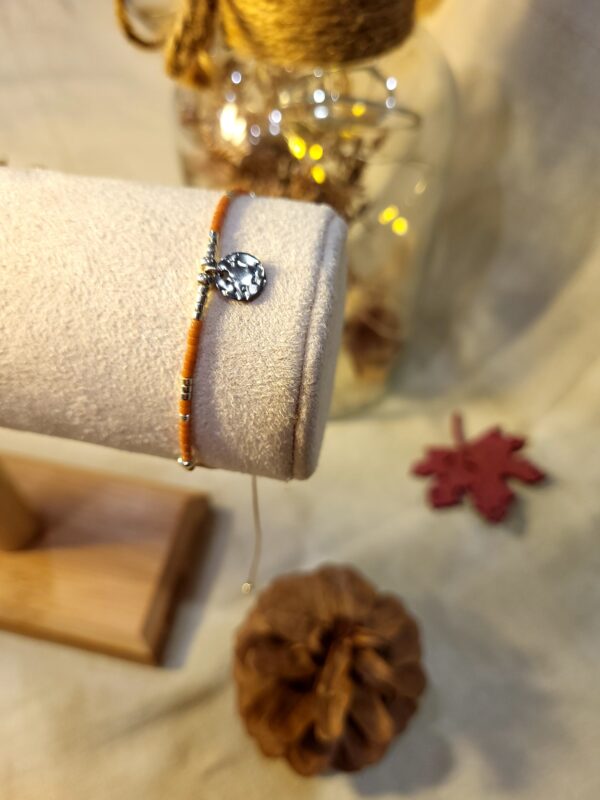 Bracelet perle et breloque martelée